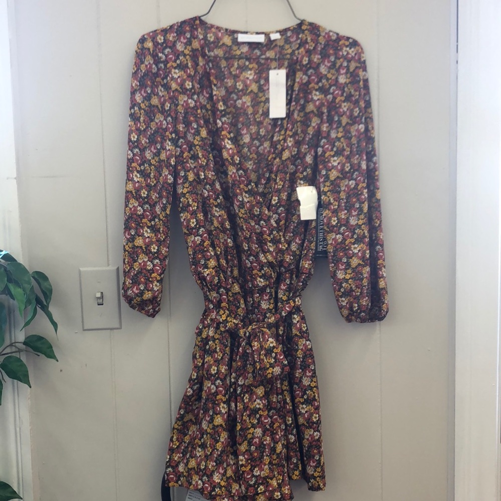 Flower long sleeve romper size XS